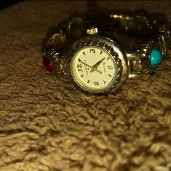 EXPLRAESS silver tone watch with a red and blue st - Picture 4 of 8